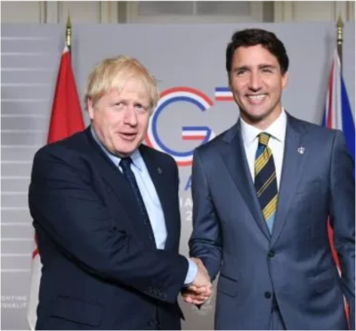 G7サミットの場で、GCF拠出金増額をそろって表明した英ジョンソン首相とカナダのトルドー首相