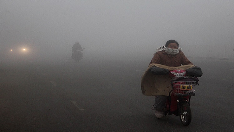 Cyclists ride on a road in heavy smog in Hefei city, east Chinas Anhui province, 14 January 2013.

For the fourth straight day, health authorities in multiple Chinese cities advised residents to stay indoors Monday (14 January 2013), as a blanket of smog continued to choke much of China after recording beyond index levels last weekend at air quality monitoring stations in Beijing. The capital and 32 other cities suffered hazardous air last weekend, local media reported, swelling hospitals with patients reporting respiratory and heart problems. Face masks sold quickly at pharmacies, and some airports and highways suffered delays and closures amid greatly reduced visibility. But the governments increased disclosure of pollution data, and the state medias blanket coverage of the crisis, encouraged some Chinese environmentalists to see a silver lining amid the clouds darkening the worlds largest emitter of greenhouse gases, where the priority of fast economic growth routinely swamps environmental concerns.
